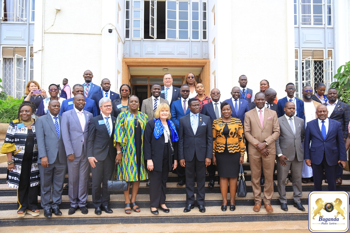 Stephanie Urchick poses with Katikkiro Mayiga, ministers, Kabaka’s government leaders, and Rotarians from various clubs during her visit to Bulange Stephanie Urchick poses with Katikkiro Mayiga, ministers, Kabaka’s government leaders, and Rotarians from various clubs during her visit to Bulange